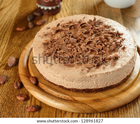 Cold chocolate cheesecake on brown table