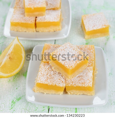 Traditional lemon bars on a white table