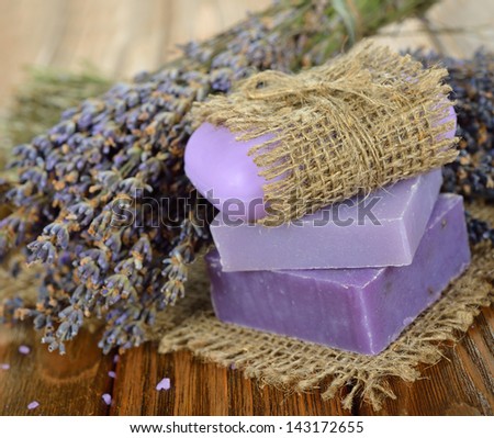 lavender soap on a brown table