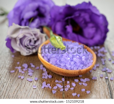 Purple sea salt close-up on a brown table