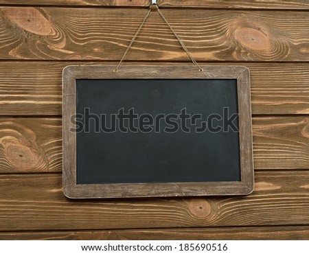 Writing board on brown background