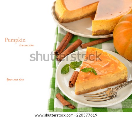 Pumpkin cheesecake with caramel icing on white background