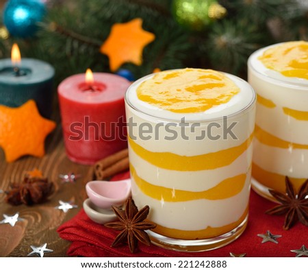 Holiday dessert with orange topping on brown background