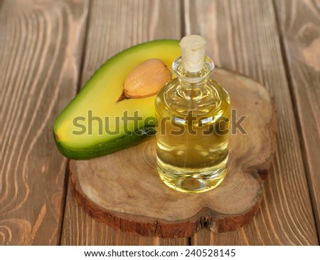 Avocado oil on a brown background