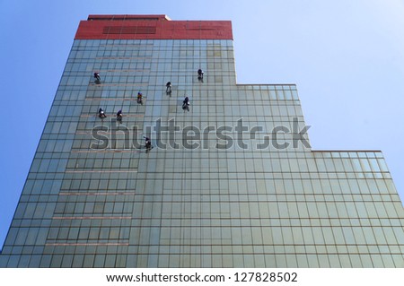 window washers on a highrise office building