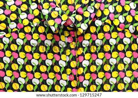 close up of cherry-pattern shirt