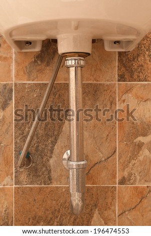 metal pipe of bathroom sink
