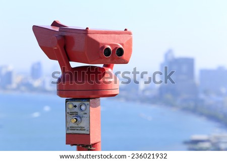 binoculars for sightseeing from the view point of Pattaya city, Thailand