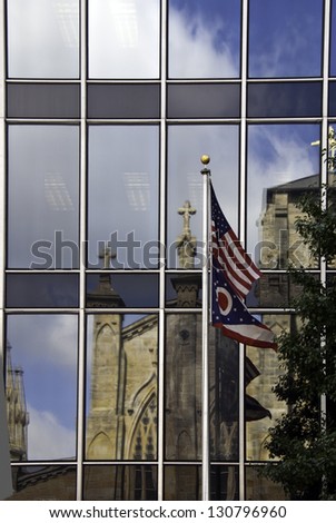 A view of a reflections with an American and a State of Ohio flag in front.