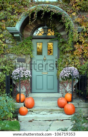 Front door of family home with Halloween decorations