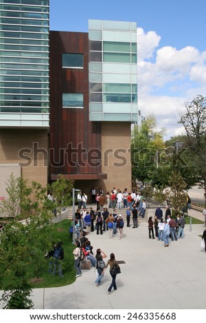 TORONTO - OCTOBER 2014: Students mingle outside a science building at the University of Toronto, which was rated as the top university for science outside the United States in October 2014.