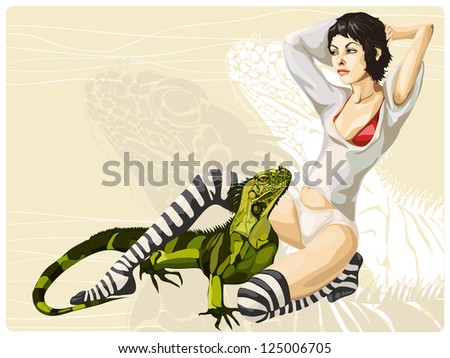Brunette with short hair sitting on her knees and a big green iguana between her legs