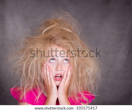 Girl with crazy bed head or tangled hair