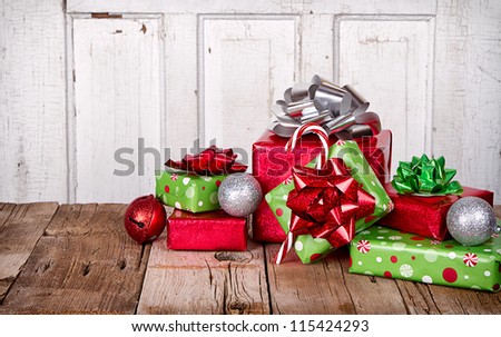 Christmas Presents and Ornaments on Wooden Background