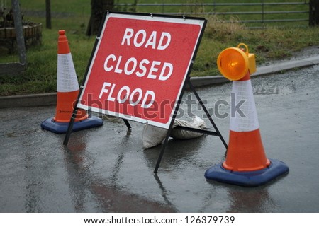 road closed sign flood warning
