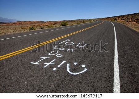 Highway with encouraging message saying \