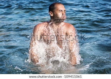 glamour portrait of the man on sea