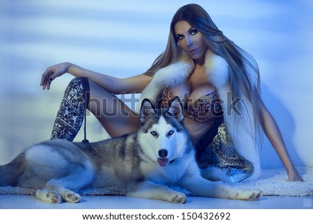 Bikini Fashion Model with siberian husky. Fashion art photo
