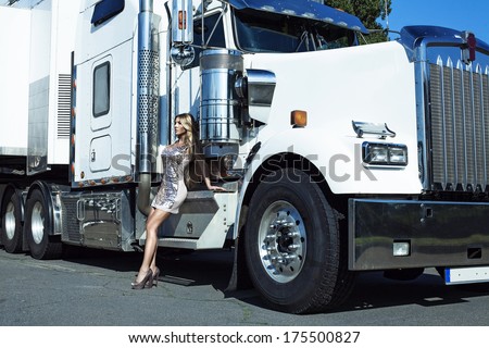 Sexy woman in dress near truck