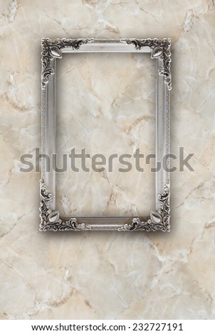 old silver picture frame on the marble effects background