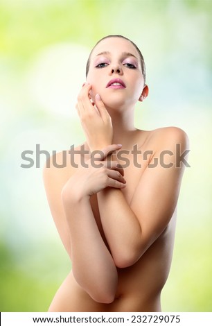Body of woman on green background concept of beauty and well-being
