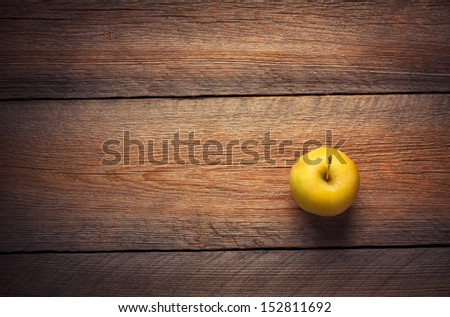 One Apple on Wooden Tabletop
