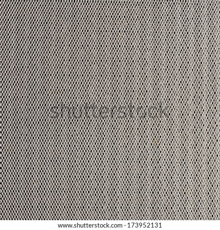 White Metallic Netting over the Black Background