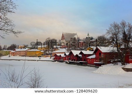 Riverside storage buildings in Old Porvoo at cold winter day