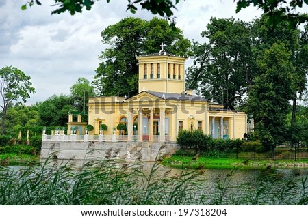 Newly restored Tsarina\'s Pavilion on small island in Olga\'s pond, opposite Peterhof Upper Garden at autumn.