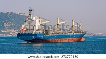 Cargo bulk vessel passes the Strait of Gibraltar