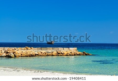 Vacation dream: sun, sea, sand and sailship