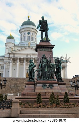 Statue of Alexander II, emperor of Russia, in front of Helsinki Lutheran Cathedral at sunrise