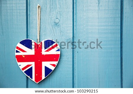 Rustic wooden Union Jack heart on blue painted wood