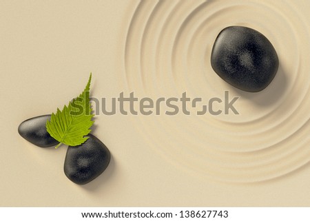 An image of a nice zen background with black stones and a leaf