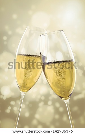 An Image Of Two Champagne Glasses On Light Bokeh Background