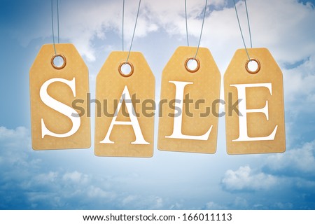 An image of nice sales tags in the blue sky