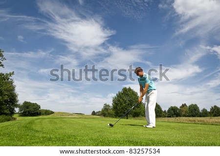 An image of a young male golf player