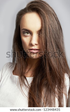 Color portrait of beautiful woman with amazing hair isolated