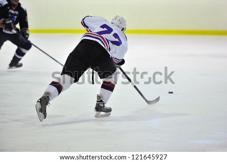 MOSCOW, RUSSIA - JANUARY 27: Unidentified hockey players compete during the Maryino (black) vs NHM (white) at HIMKYl Stadium, score 3-2, on January  27, 2011 in Moscow Russia