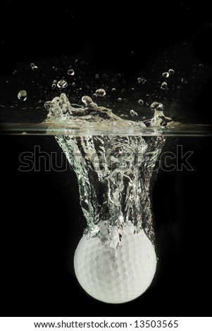 splashing golf ball into a water