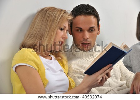 beautiful couple read the book