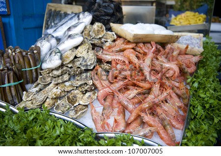 fresh oysters and prawns at the fishmongers