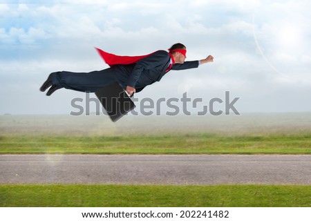superhero businessman with cape and mask flying