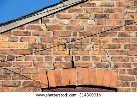 step cracking above a window caused by subsidence