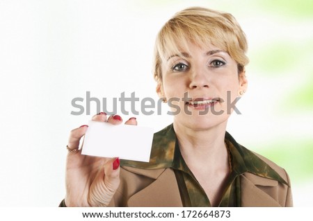 Portrait of business woman giving blank business card