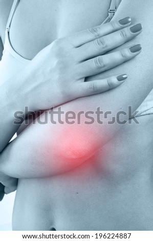 Woman with elbow pain isolated on white background