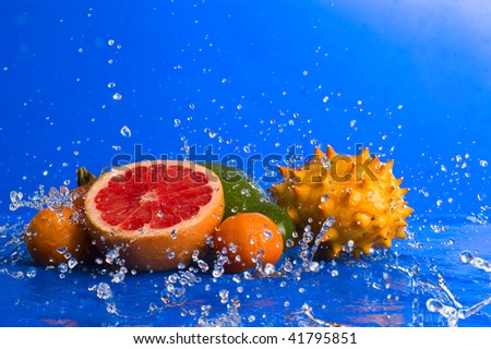 Splashing fruit still life