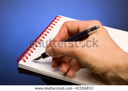 pen in hand isolated