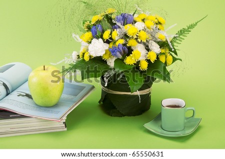 still life with flower,magazines and coffee