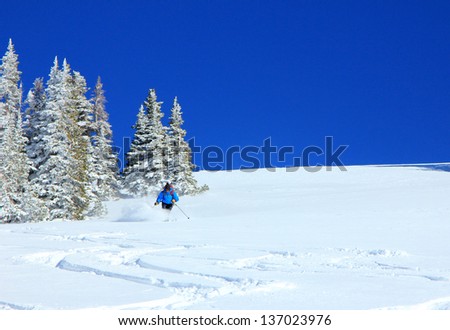 Skiing in Utah on a beautiful winter day.